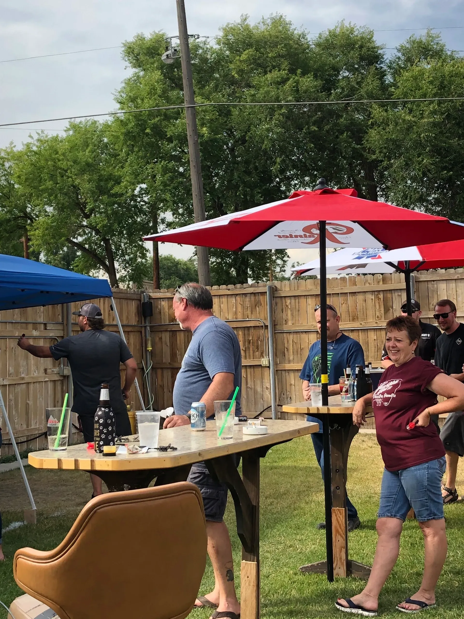 Outdoor gathering under umbrellas